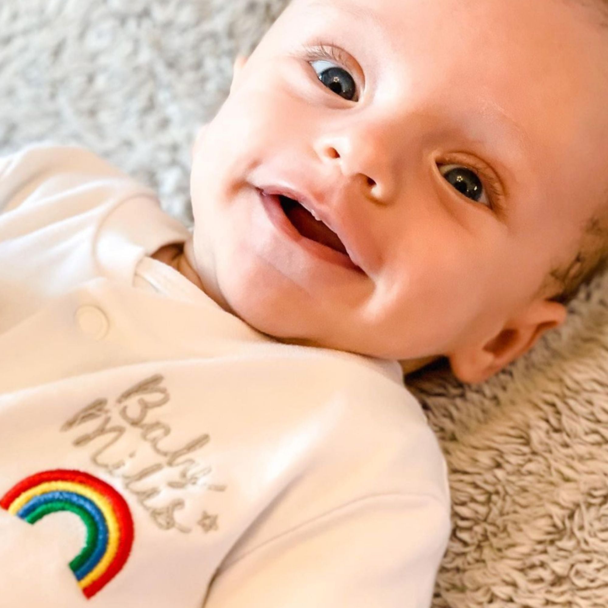 Personalised Rainbow Sleepsuit with Embroidered Name
